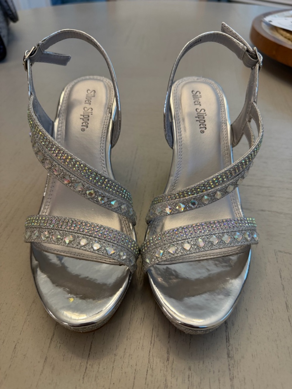 Silver Slippers wedge heels. Sling back, adjustable strap. Size 6